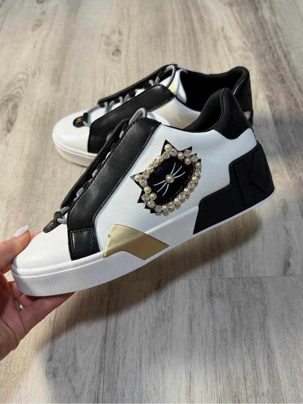 Karl Lagerfeld White and Black Sneakers with Gold and Pearl Cat Emblem